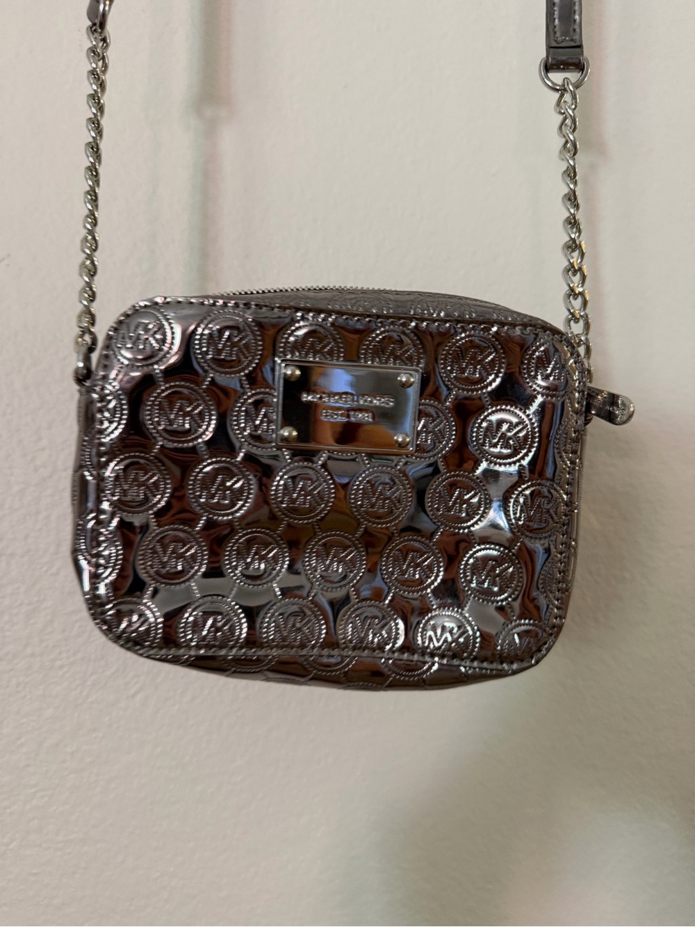 Michael Kors Metallic Silver MK Embossed Crossbody Bag